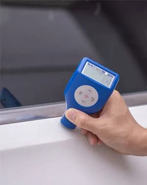 Paint thickness gauge measurement on a vehicle panel